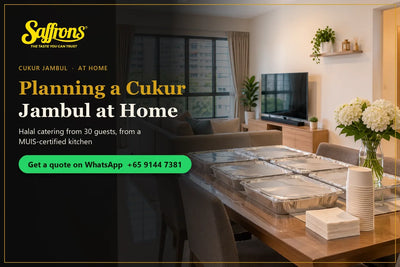 Covered catering trays on a dining table in an HDB living room, ready for a family gathering