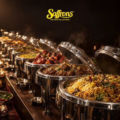 Halal catering for 200 pax Singapore: a long line of silver chafing dishes with briyani, mutton masala and chicken